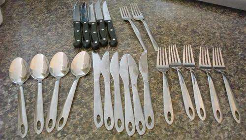 Knives and forks with steak knives