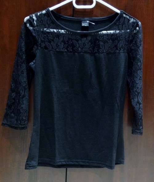 Womans  Size small top with lace sleeves