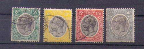 Tanganyika. Group of 4 stamps. Used/hinged/rust
