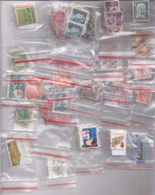 Australia.  Many stamps filed in 25 reclosable bags. Duplications/unchecked. See note