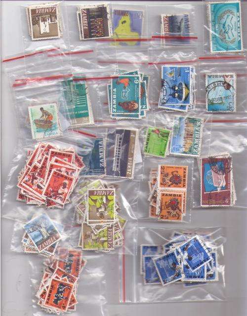 Zambia. Many stamps filed in 21 reclosable bags.Duplications/unchecked. See note