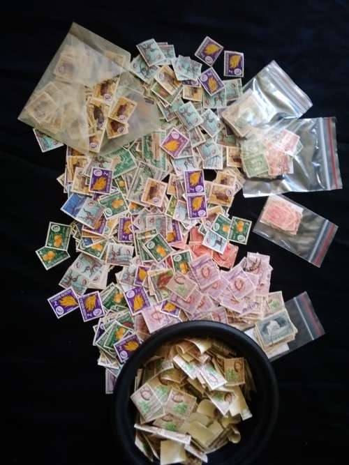 Southern Rhodesia. Many, many used stamps off paper. Duplications/Unchecked