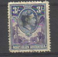 Northern Rhodesia. 1 x 3 Shilling stamp. Used/hinged/slightly spoiled