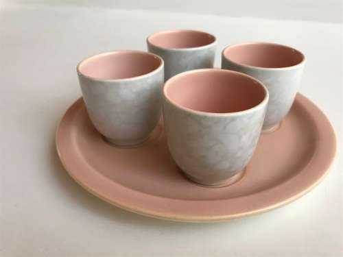 Poole pottery twin tone four-egg cup breakfast set with stand
