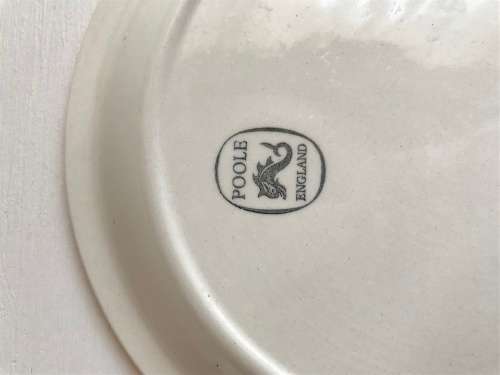 Poole pottery twin tone four-egg cup breakfast set with stand