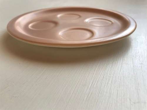 Poole pottery twin tone four-egg cup breakfast set with stand