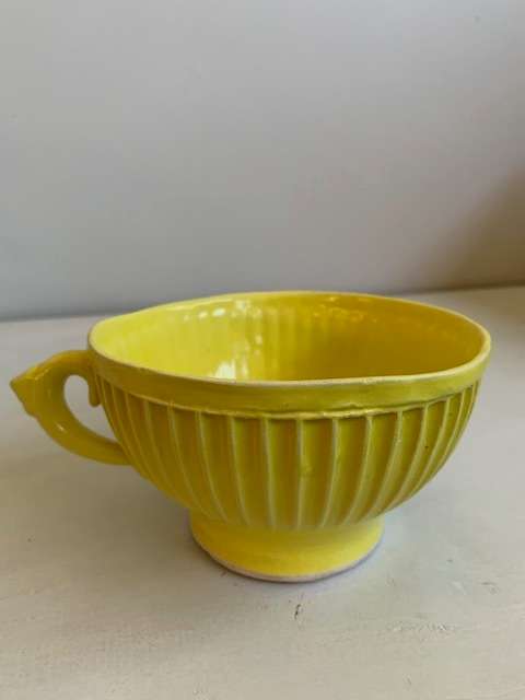 Large, bright yellow `The Conran Shop` bowl/cup