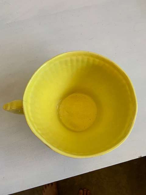 Large, bright yellow `The Conran Shop` bowl/cup