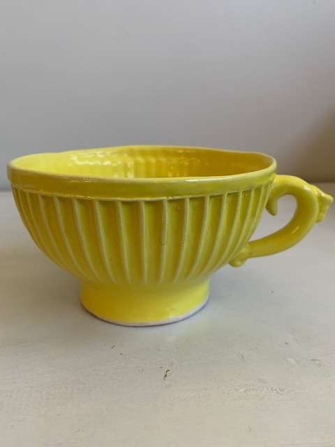 Large, bright yellow `The Conran Shop` bowl/cup