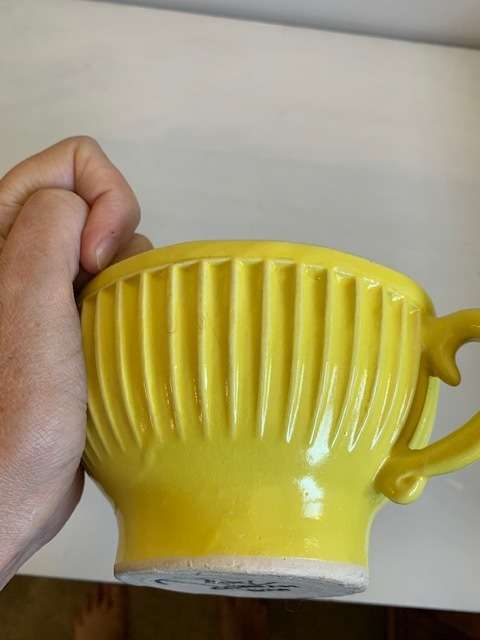 Large, bright yellow `The Conran Shop` bowl/cup
