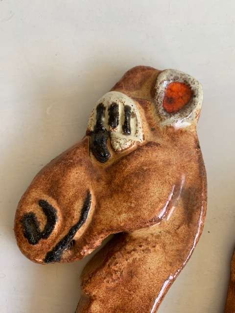 Friendly ceramic camel wall hanging/decoration