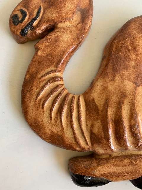 Friendly ceramic camel wall hanging/decoration