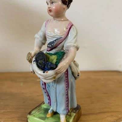 Collecting the harvest figurine