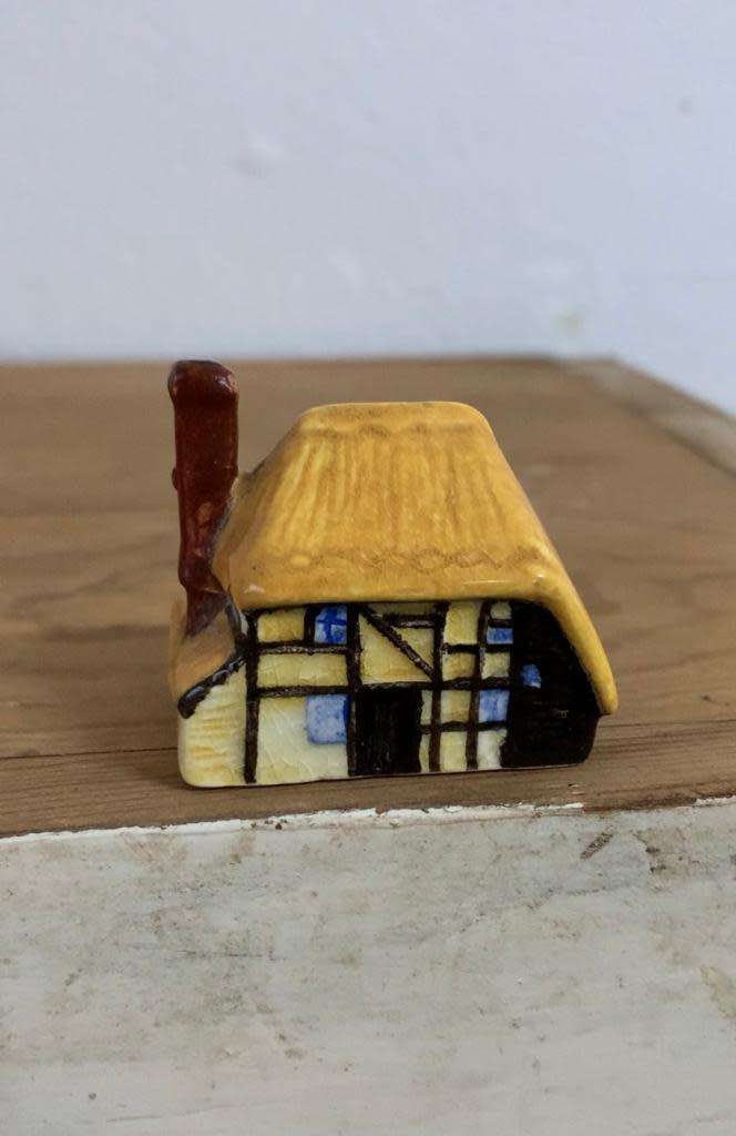 #88 Handpainted and signed ceramic thatch cottage