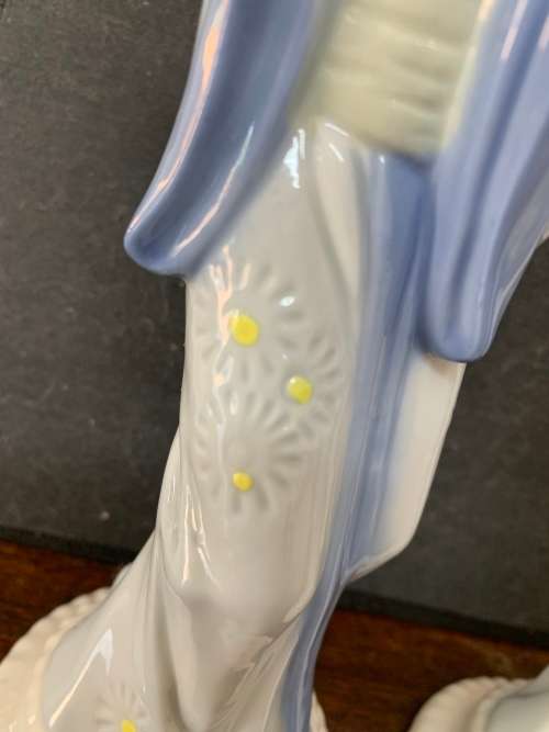 Pair Of Porcelain Geisha Figurines