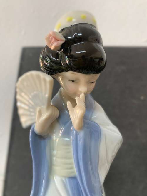 Pair Of Porcelain Geisha Figurines