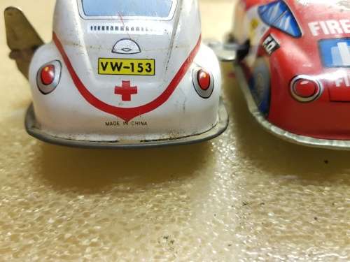 4x Vintage clockwork tin plate cars (80mm)