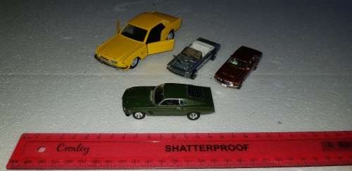 Lovely lot of 4 ford mustang die cast cars