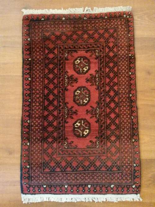 Persian Carpet:  87 x 54 cm