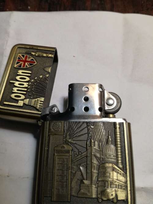 Flint lighter with embosed London emblem