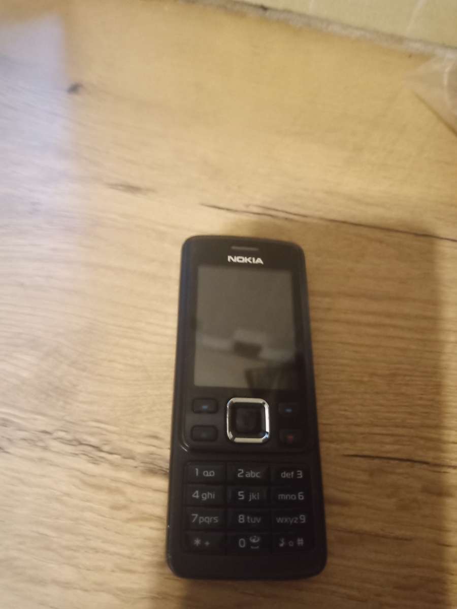 Four old cellphones unknown condition