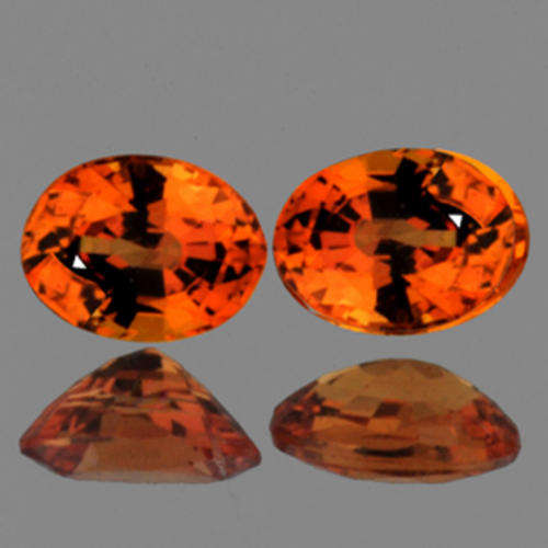 STUNNING PAIR OVAL CUT ORANGE SAPPHIRE