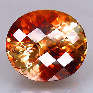STUNNING! 23.12ct OVAL CUT ORANGE BROWN IMPERIAL TOPAZ