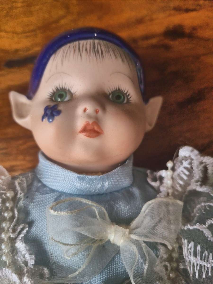 One bid for the Family  four vintage porcelain dolls