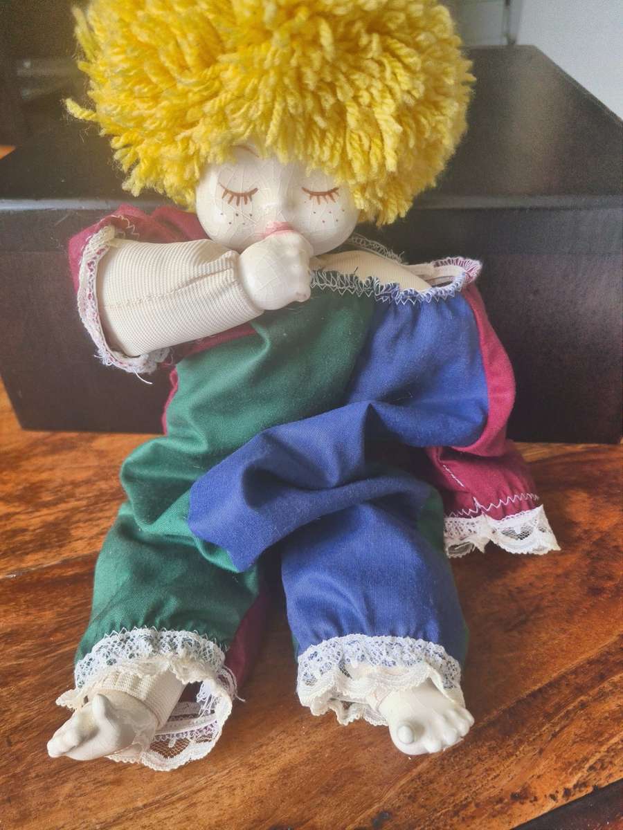 One bid for the Family  four vintage porcelain dolls