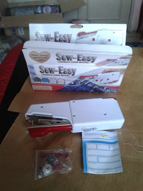 SEW EASY (HAND HELD SEWING MACHINE)