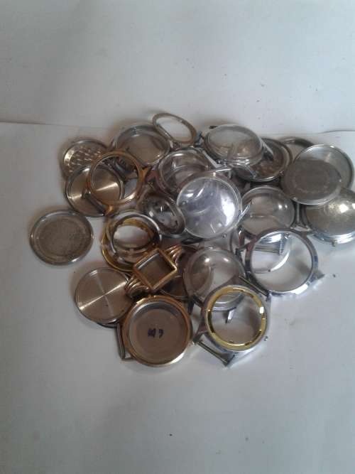 JOB LOT ORIGINAL WATCH SPARES (FRONT GLASS,RINGS AND BACK COVERS)OVER 30 PIECE