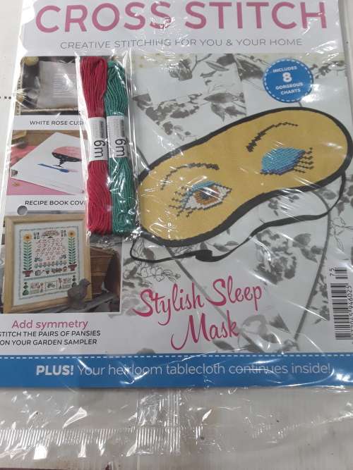 8 ISSUES OF CROSS STITCH PATTERNS(INCL.CANVAS,NEEDLES,COTTONS,BINDER, ETC...)ONE BID