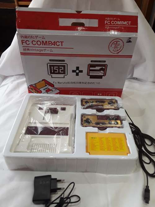 VINTAGE TV GAME INCL.100 IN ONE GAME CARTRIDGE