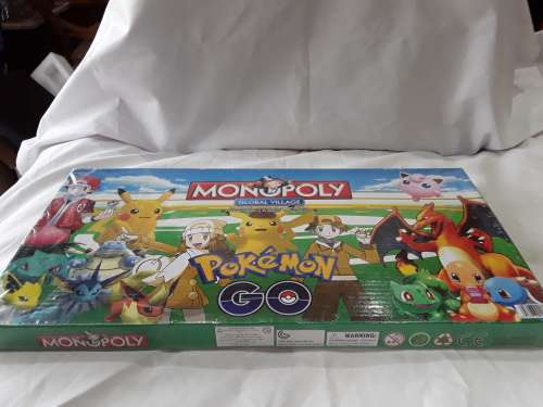 POKEMON MONOPOLY GLOBAL VILLAGE BOARD GAME (SEALED)