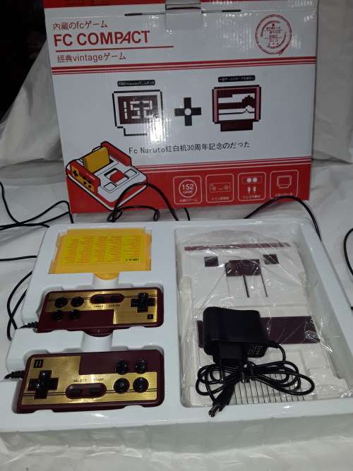 VINTAGE TV GAME WITH 100 IN ONE GAME CARTRIDGE