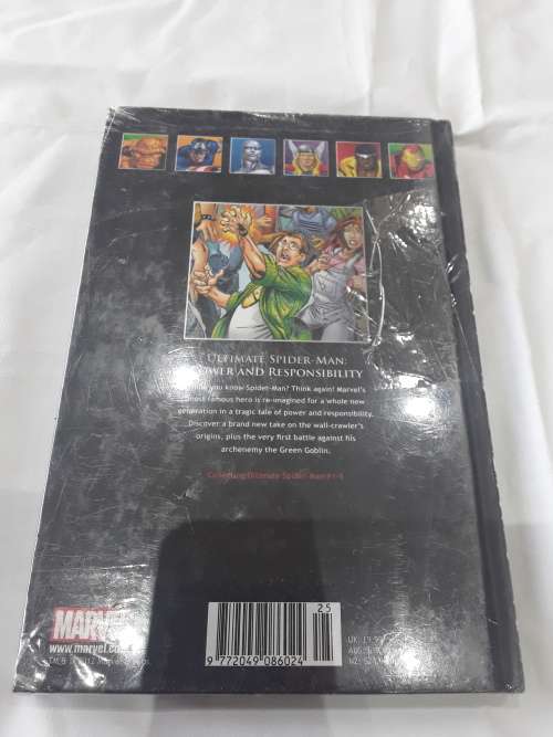 MARVEL HARDCOVER COMIC (SPIDERMAN)POWER AND RESPONSIBILITY