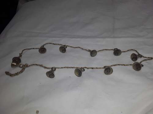 11 X SOLID BRASS BELLS ON STRING(90CM LENGTH)