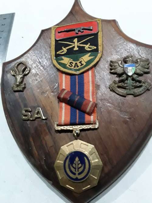 SA MILLITARY MEDALLION AND OTHERS ON SOLID WOODEN WALL PLAGUE