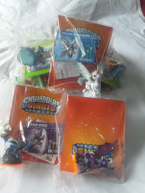 10 X SKYLANDERS FIGURES(WITH CARDS AND STICKERS)ONE BID FOR ALL