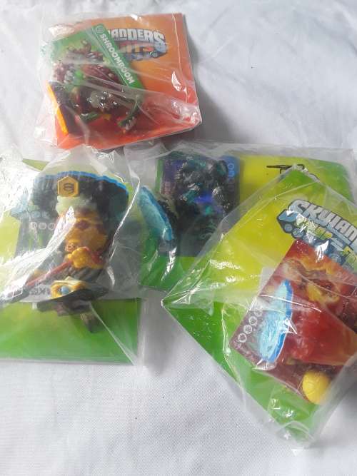 10 X SKYLANDERS FIGURES(WITH CARDS AND STICKERS)ONE BID FOR ALL