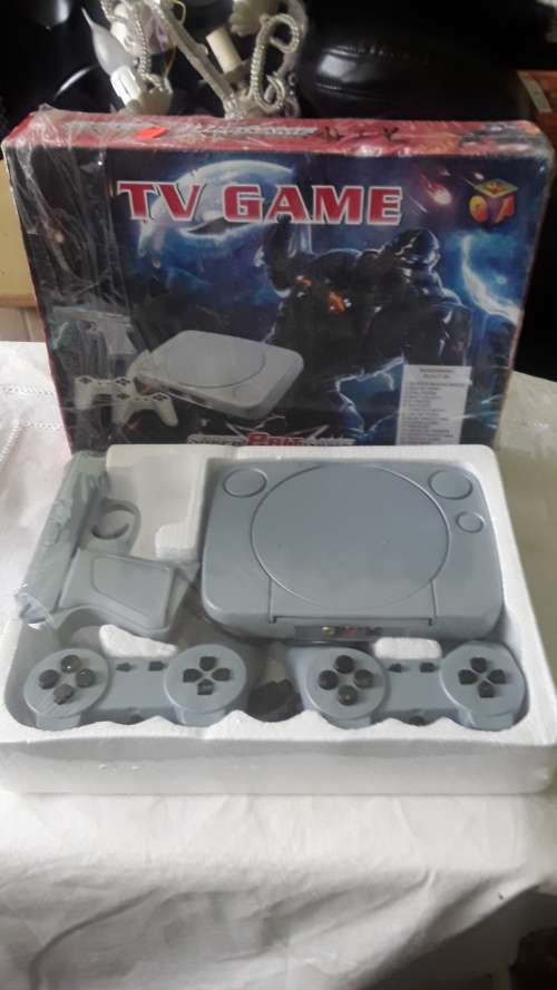 TV GAME WITH BUILT IN GAMES INCLUDES SUPER MARIO (SEALED UNIT)