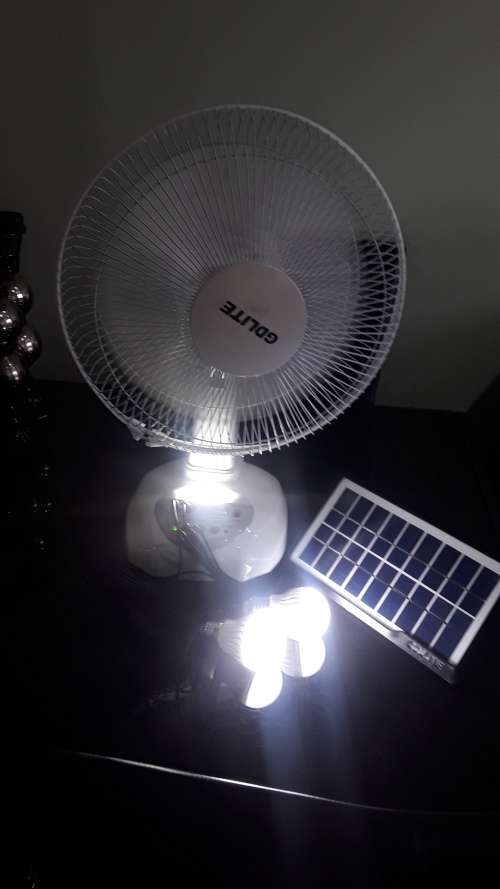 LED SOLAR POWERED FAN AND LIGHTS(SOLAR PANEL,BATTERY,2 LIGHTS AND FAN)