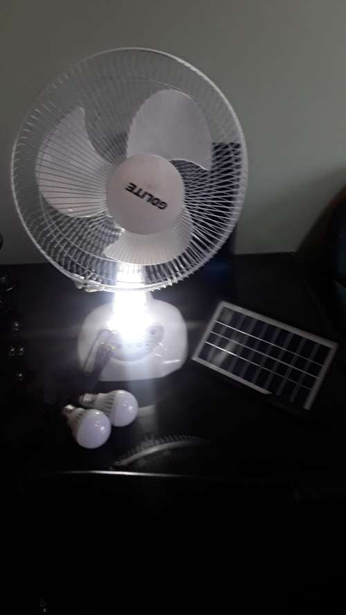 LED SOLAR POWERED FAN AND LIGHTS(SOLAR PANEL,BATTERY,2 LIGHTS AND FAN)