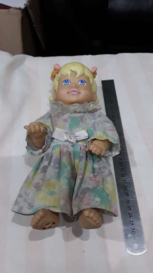 VINTAGE DOLL WITH BOW