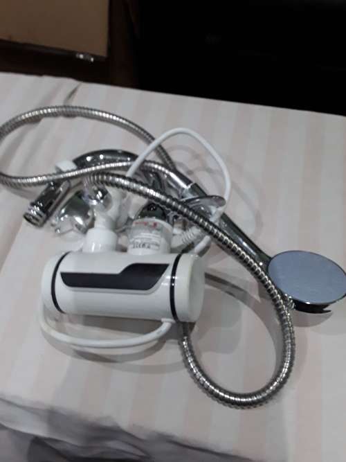 INSTANT ELECTRIC HEATING WATER FAUCET AND SHOWER