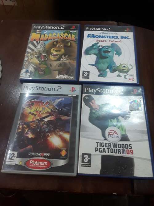 SONY PS11 CONSOLE WITH 2 CONTROLS,POWER SUPPLY AND 9 ORIGINAL GAME DISCS