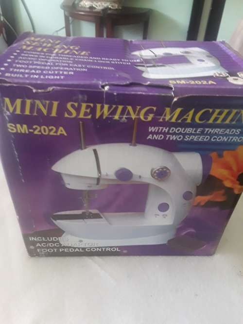 DOUBLE SPEED CONTROL MINI SEWING MACHINE (FREE ASSESCORIES)
