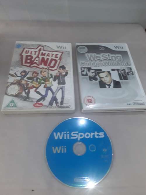 NINTENDO WII INCLUDING POWER SUPPLY,2 REMOTES,6 GAME DISCS AND ASSESCORIES