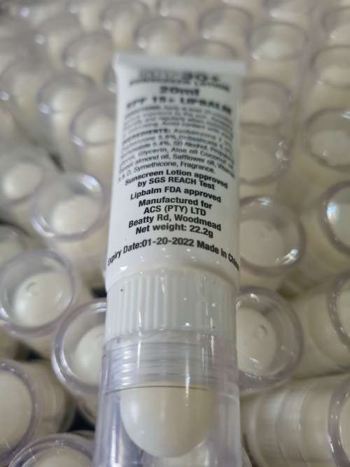BOX OF 150 SPF 30+(2 IN ONE)SUNSCREEN LOTION AND LIP BALM,20ml