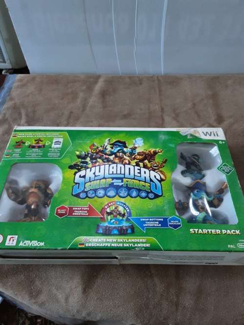 SKYLANDERS SWAP FORCW WII STARTER PACK(UNUSED)INCL.3 FIGURES,WII DISC,PORTAL POWER STAND AND CABLE,E
